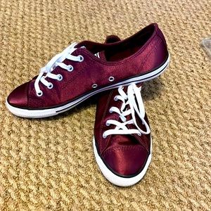 Converse All Star tennis shoes.